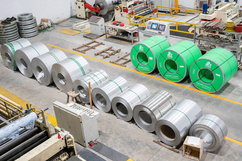 stainless steel coils stacked in the factory area