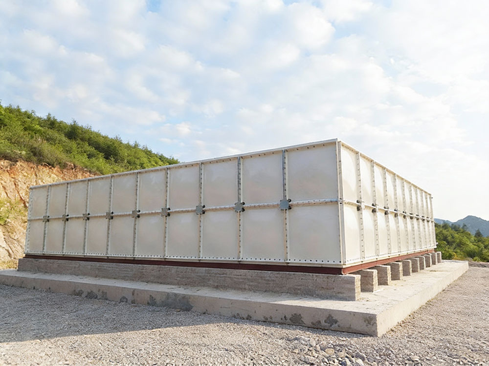 Outdoor fiberglass water tank for agricultural use.