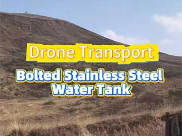 Drone transport of a custom bolted stainless steel water tank for rainwater harvesting and agricultural irrigation.