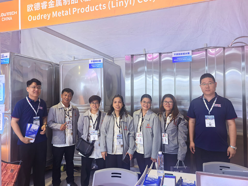 Overseas procurement teams discuss modular sectional water tank specifications and applications.