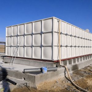 Modular rainwater harvesting tanks store seasonal rainfall to provide reliable water for crop irrigation, greenhouse farming